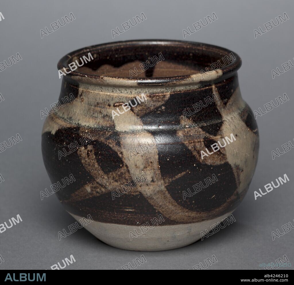 Jar: Jizhou Ware, 1200s-1300s. China, Jiangxi province, Ji-zhou kilns, Southern Song Dynasty (1127-1279) - Yuan Dynasty (1271-1368). Glazed stoneware with resist and slip-painted decoration; diameter: 13.4 cm (5 1/4 in.); overall: 11.3 cm (4 7/16 in.).