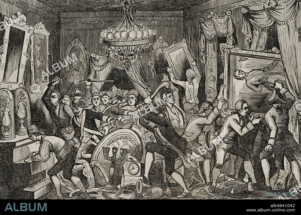 Reinado de Carlos IV de España. Motín de Aranjuez. El 17 de marzo de 1808, una pequeña multitud dirigida por miembros del Partido Fernandino (nobles cercanos al Príncipe de Asturias), se agolpó frente al Palacio Real en Aranjuez, y asaltó el Palacio de Godoy, saqueando, quemando y destruyendo todo tipo de enseres. En la mañana del 19 de marzo grupos de personas se dirigieron a la casa de Godoy de la calle del Barquillo, en Madrid. Rompieron cristales de la casa y con los muebles formaron una hoguera. Allamamiento de la casa del Príncipe de la Paz. Grabado. Historia del Levantamiento, Guerra y Revolución de España, por el Conde de Toreno. Madrid,1851.
