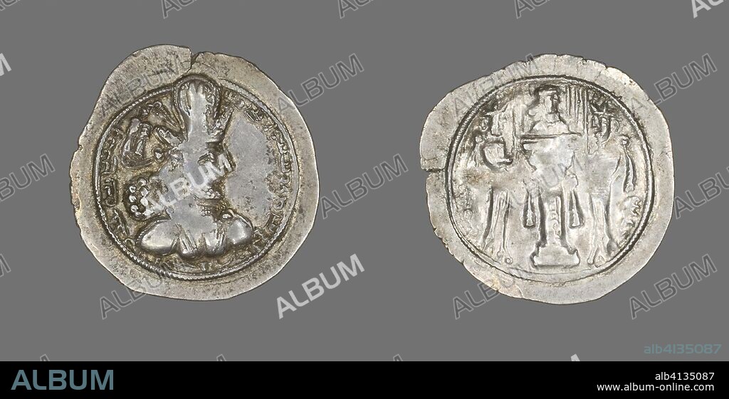 ANCIENT IRANIAN. Coin Portraying King Sapor II. Sasanian; Persia. Date: 309 AD-379 AD. Dimensions: Diam. 2.8 cm; 4.20 g. Silver. Origin: Khorasan.