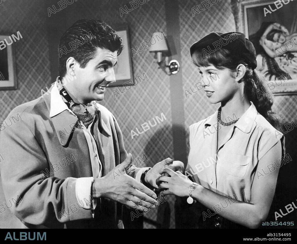 France:  November 25, 1952 Brigitte Bardot in her first film, 'Le Trou Normand'. Here she is with Roger Pierre  in the film.