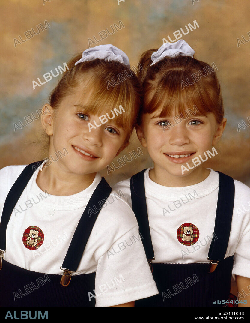 ASHLEY OLSEN and MARY-KATE OLSEN in FULL HOUSE, 1987, directed by JEFF FRANKLIN. Copyright LORIMAR PRODUCTIONS.