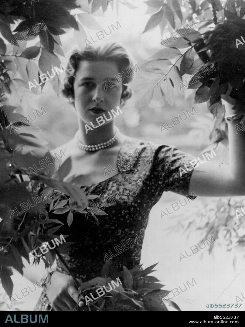 H.R.H. Princess Alexandra -- A new portrait of her royal highness Princess Alexandra of Kent, taken by Cecil Beaton at Kensington Palace, London.H.R.H. is Wearing a blue flowered silk dress and double string pearl necklace and charm bracelet. August 15, 1955. (Photo by Paul Popper, Paul Popper Ltd.).