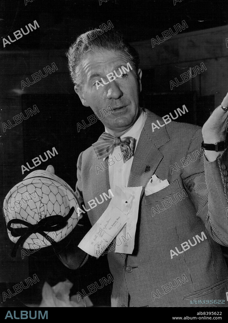 Aage Thaarup... glamor hatsThat volatile Dane, Aage Thaarup - the Queen's milliner - has obviously found a gold wine in Australia. He's flying to Australia in January on his third visit since 1952. Thaarup is bringing thousands of the more exclusive models. October 11, 1954.