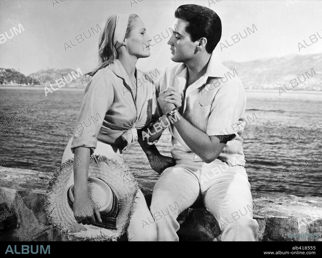 ELVIS PRESLEY and URSULA ANDRESS in FUN IN ACAPULCO, 1963, directed by RICHARD THORPE. Copyright PARAMOUNT PICTURES.