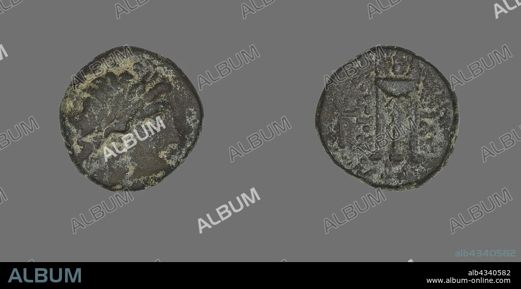 Coin Depicting the God Apollo, 261/246 BC, Greek, Ancient Greece, Bronze, Diam. 1.8 cm, 4.79 g.