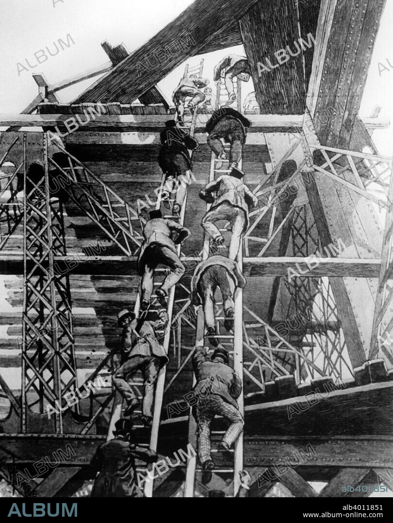 Gentlemen of the press taking the stairs on the Eiffel Tower, Paris, 1888. Members of the press visiting the tower during its construction. Designed by the French civil engineer Gustave Eiffel (1832-1923), the Eiffel Tower was built for the International Exhibition staged in Paris in 1889 to commemorate the centenary of the French Revolution. Constructed from iron, it was the tallest building in the world until 1930.