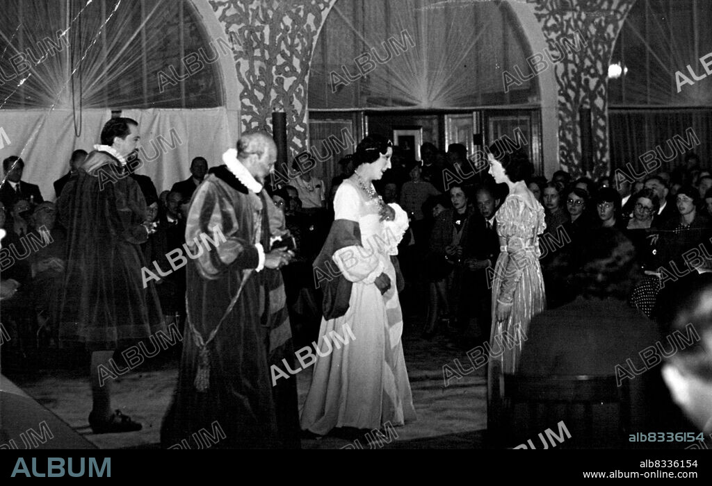 Old Vic Production Of "Hamlet" In Original Setting At Kronborg Castle, Elsinore. The scene during the now famous 'cabaret" performance of "Hamlet" which was performed in the dance hall of an hotel at Kronborg when the open air premier was washed out.
"Ophelia" (Vivien Leigh) and "Gertrude" (Doroth Dix) are seen in centre. July 20, 1937. (Photo by LNA).