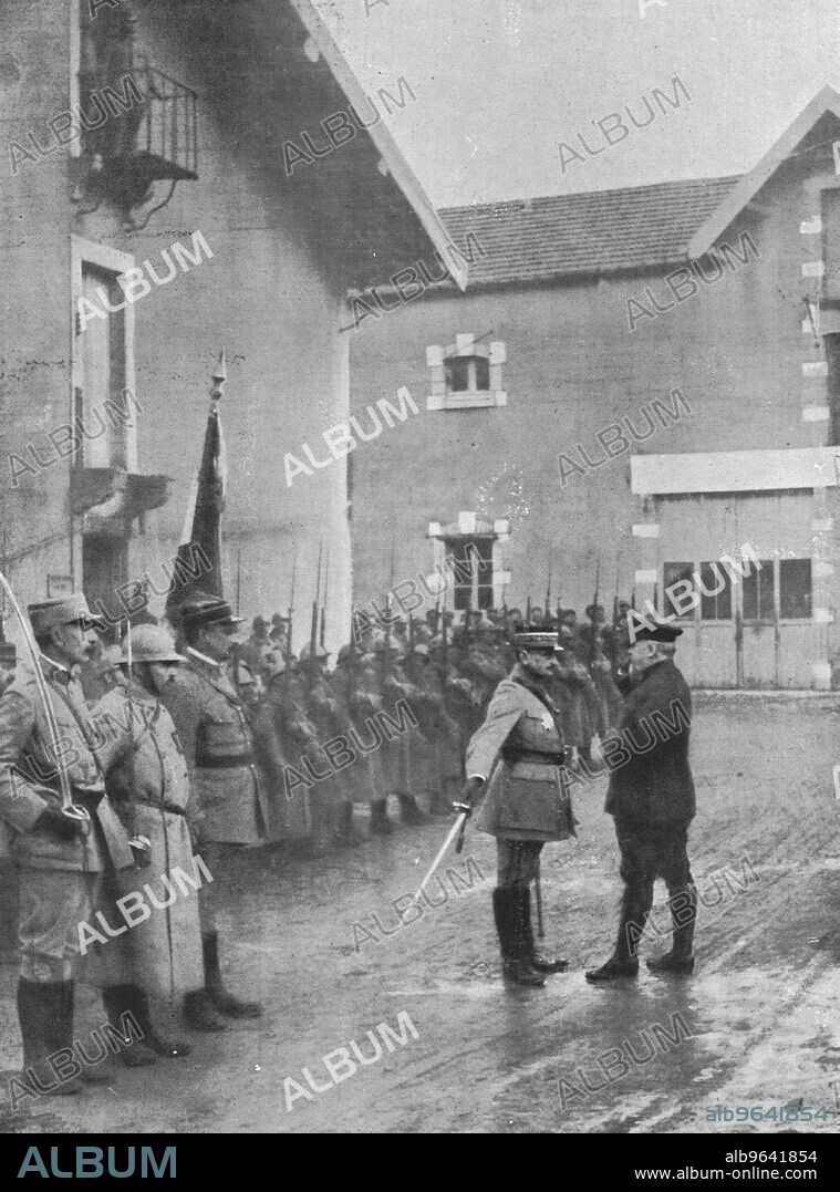 'M. Poincare a Verdun; le general Mangin, salue de l'epee le President de la Republique qui vient de lui remettre la plaque de grand officier de la Legion d'honneur.', 1916. From "Collection de la Guerre IV. L'Illustration Tome CXLVII. La Guerre Juillet, Aout, Septembre, Octobre, Novembre, Decembre 1916".