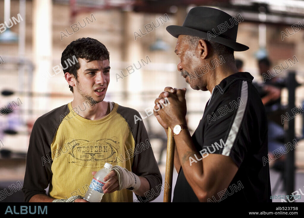JAY BARUCHEL and MORGAN FREEMAN in MILLION DOLLAR BABY, 2004, directed by CLINT EASTWOOD. Copyright WARNER BROS. / WALLACE, MERIE W.