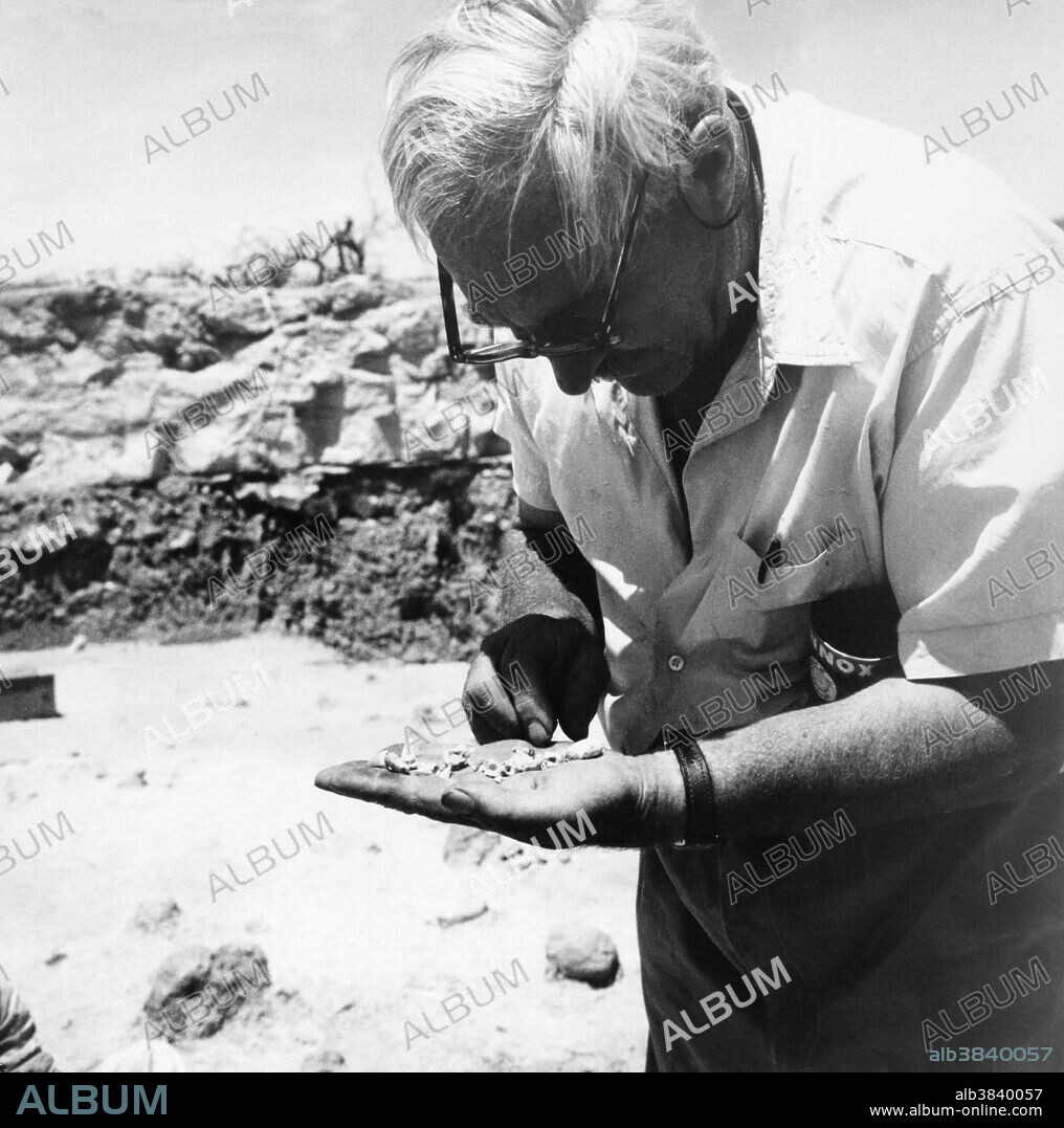 Dr. Louis Leakey at work in the Olduvai Gorge, Tanzania, Africa. Dr. Leaky, an anthropologist, did extensive work in Africa. He believed that early man developed in Africa and spent most of his life studying tools, bones and other artifacts.