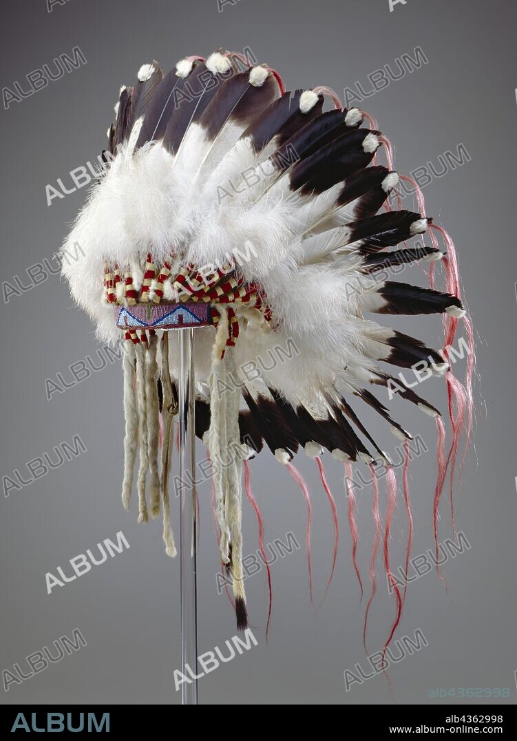 Crow, Native American, Feather Headdress, ca. 1890, leather, eagle feathers, ermine skins, glass beads and horse tail, Overall: 35 × 25 × 23 inches (88.9 × 63.5 × 58.4 cm).