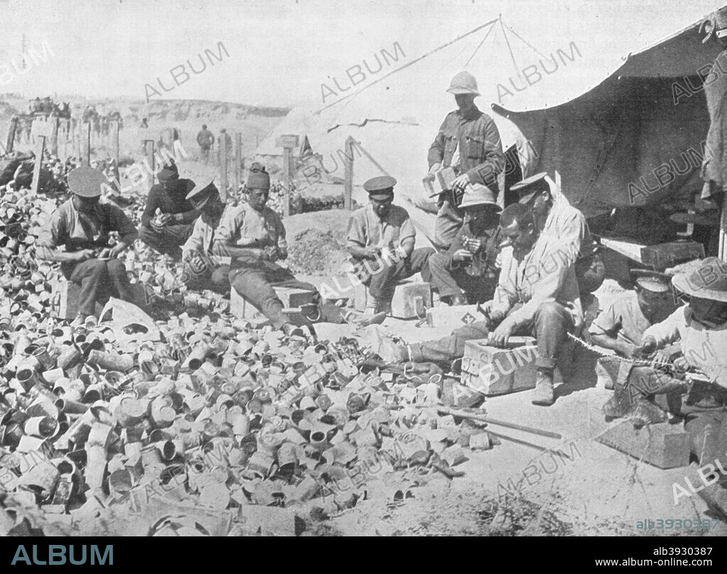'Making bombs out of tin cans in Gallipoli', 1915. From The Manchester Guardian History of the War Vol. III - 1915.. [John Heywood Ltd, London, 1915].