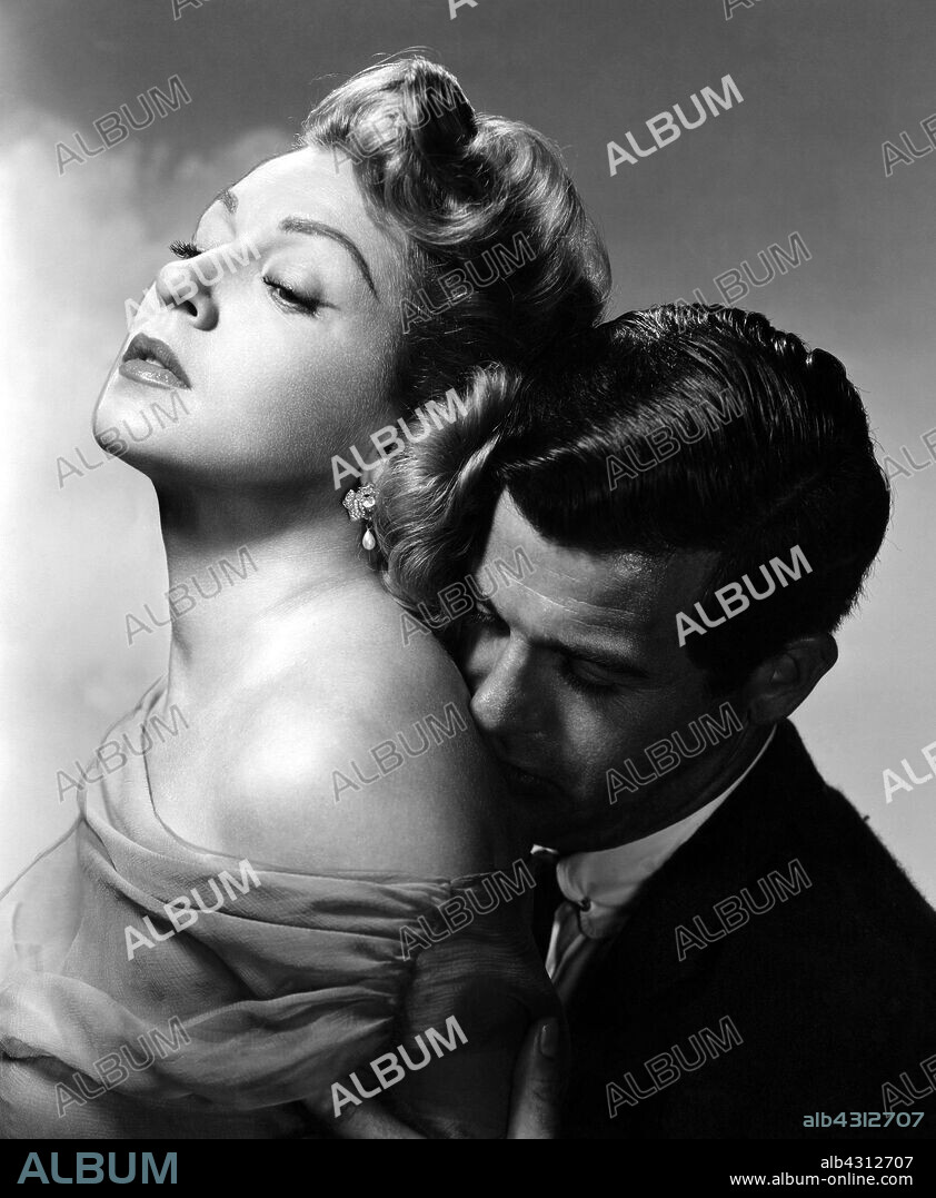 LANA TURNER y LEE PHILIPS en VIDAS BORRASCOSAS, 1957 (PEYTON PLACE), dirigida por MARK ROBSON. Copyright 20TH CENTURY FOX.