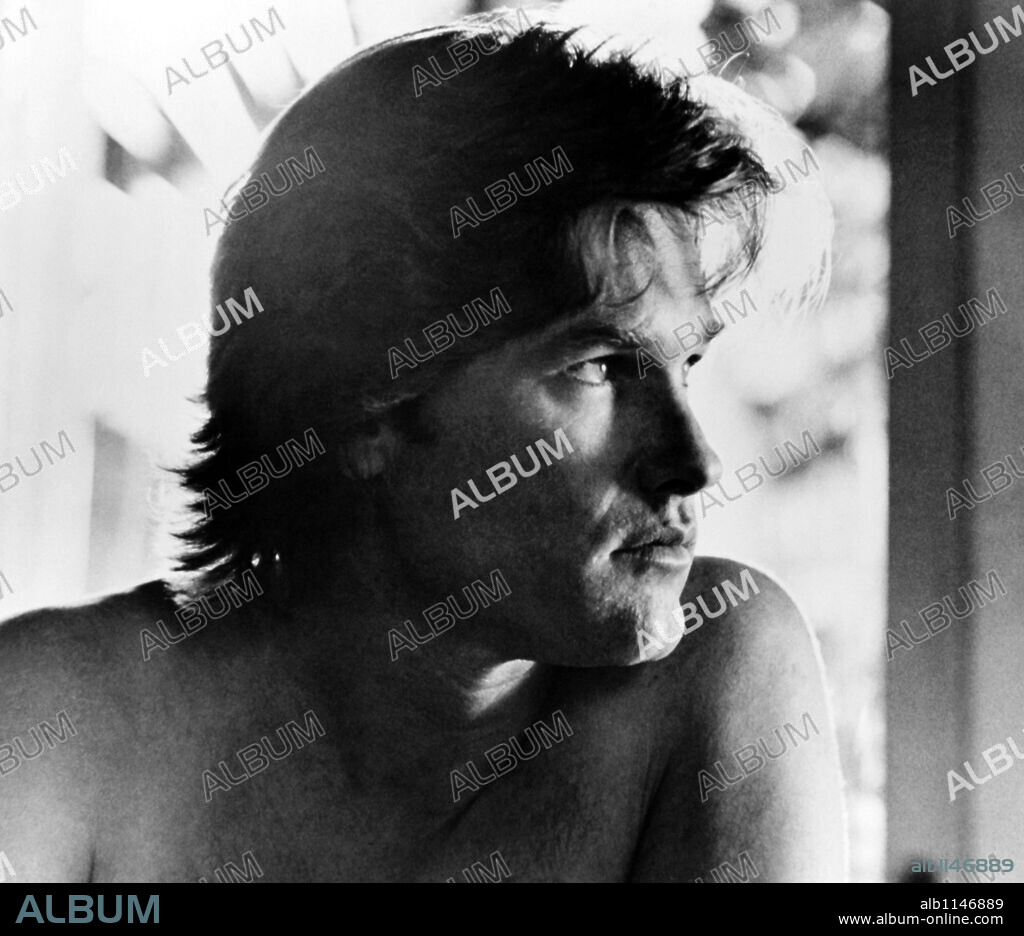 KURT RUSSELL in THE MEAN SEASON, 1985, directed by PHILLIP BORSOS. Copyright ORION PICTURES.
