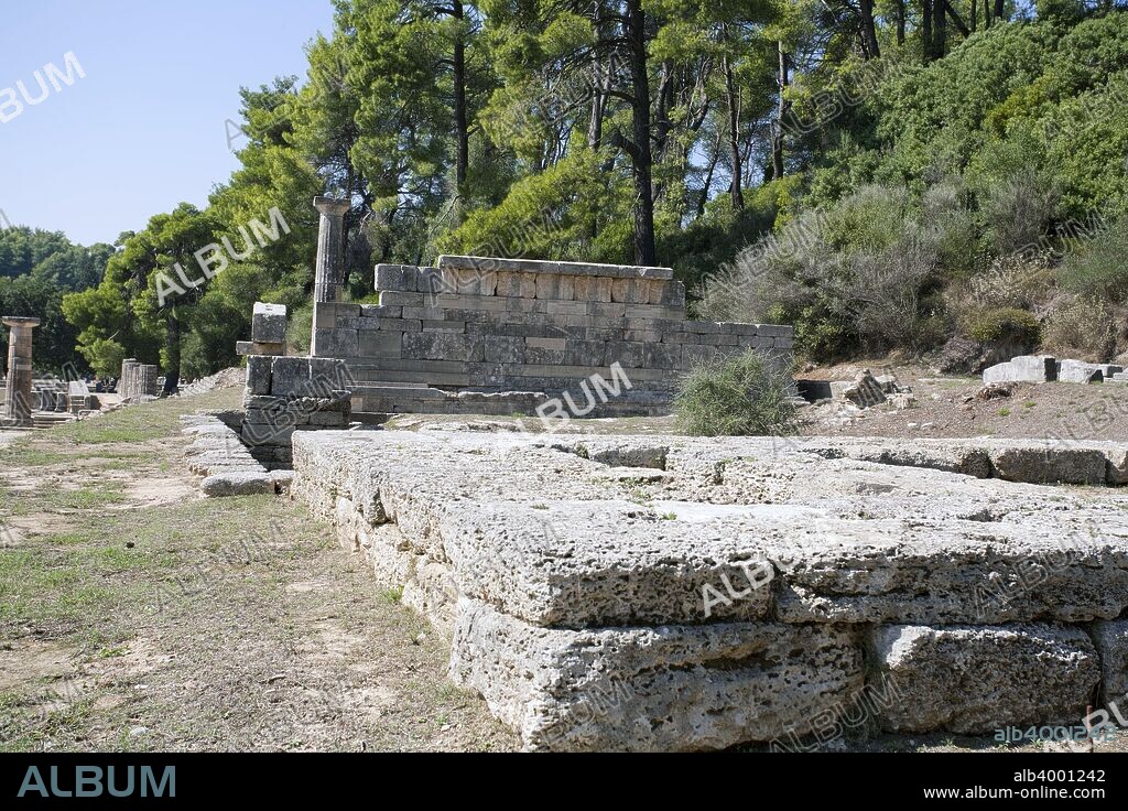 Treasuries in Olympia, Greece. The term 'treasury' was first used in Classical times to describe the votive buildings erected to house gifts to the gods. In Ancient Greece treasuries were almost always physically incorporated within religious buildings such as temples, thus making state funds sacrosanct and adding moral constraints to the penal ones to those who would have access to these funds. Olympia, a sanctuary of ancient Greece, is probably best known for having been the site of the Olympic Games in classical times.