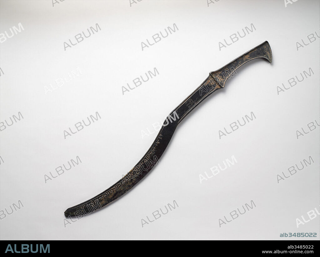 Sickle sword, Middle Assyrian, ca. 1307–1275 B.C., Northern Mesopotamia, Assyrian, Bronze, L. 54.3 cm, Metalwork-Implements-Inscribed, This curved sword bears the cuneiform inscription 'Palace of Adad-nirari, king of the universe, son of Arik-den-ili, king of Assyria, son of Enlil-nirari, king of Assyria,' indicating that it was the property of the Middle Assyrian king Adad-nirari I (r.