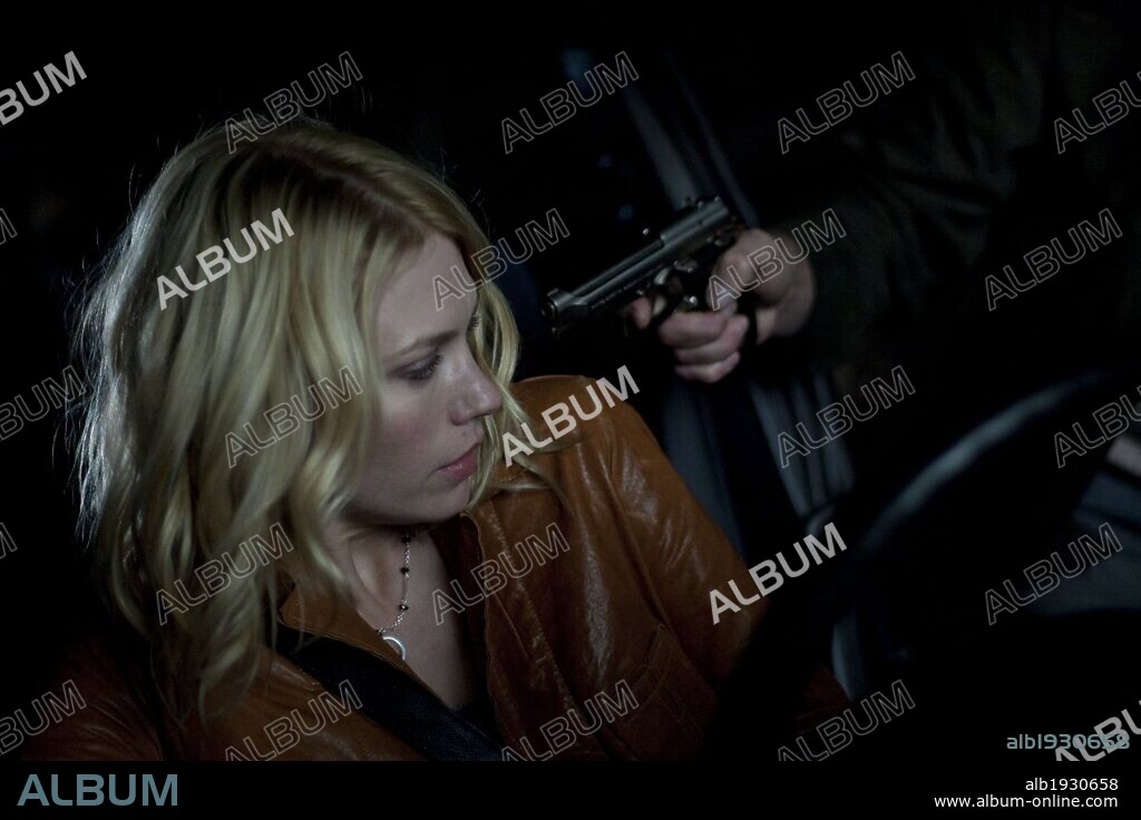 JANUARY JONES in SEEKING JUSTICE, 2011, directed by ROGER DONALDSON. Copyright ENDGAME ENTERTAINMENT.
