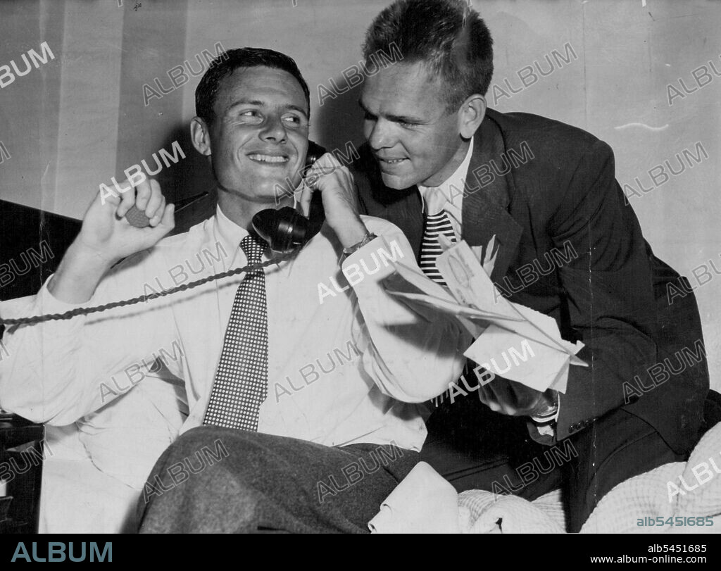 Congratulations - All smiles, Davis Cup winners Ted Schroeder (left) and Jack Kramer received many congratulations at their hotel in Melbourne. December 29, 1946.