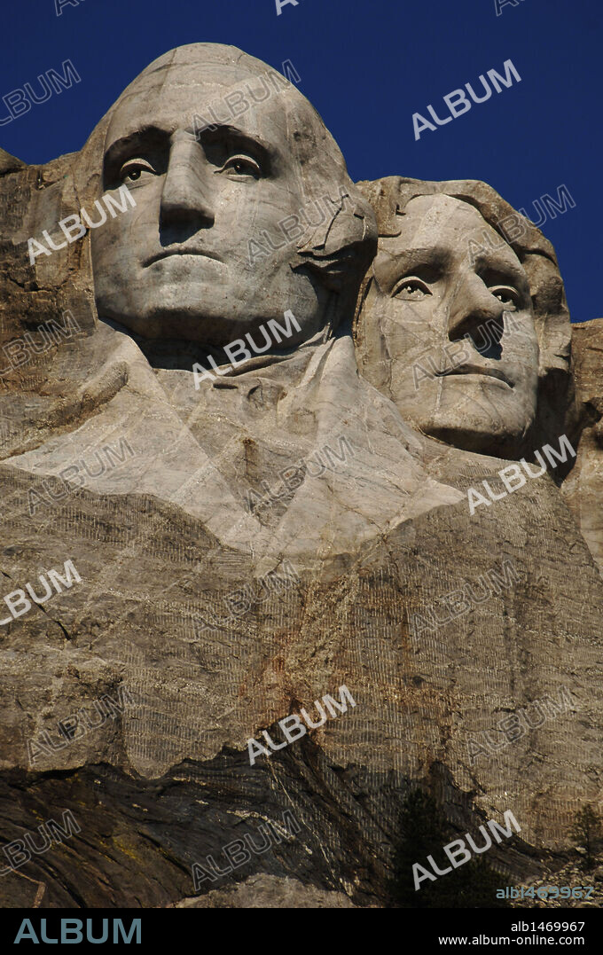GUTZON BORGLUM. United States. Mount Rushmore National Memorial. Heads of the United States's presidents carved into Mount Rushmore. Detail. From left to right, George Washington and Thomas Jefferson. 1927-1941. By Gutzon and Lincoln Borglum. Keystone.