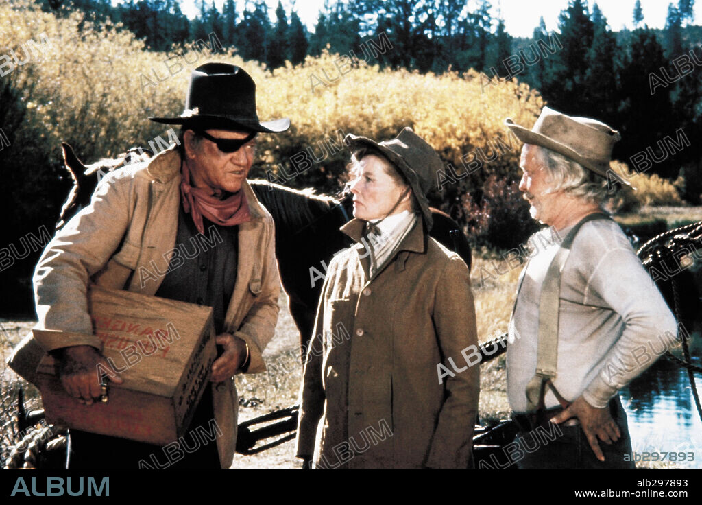 JOHN WAYNE and KATHARINE HEPBURN in ROOSTER COGBURN, 1975, directed by STUART MILLER. Copyright UNIVERSAL PICTURES.
