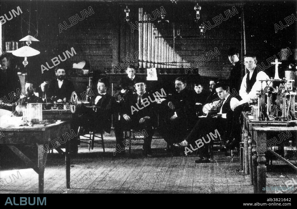 Undated photograph of Edison and staff at his Menlo Park laboratory. Thomas Alva Edison (February 11, 1847 - October 18, 1931) was an American inventor and businessman. He developed many devices that greatly influenced life around the world, including the phonograph, the motion picture camera, and a long-lasting, practical electric light bulb. Dubbed "The Wizard of Menlo Park". He was one of the first inventors to apply the principles of mass production and large teamwork to the process of invention, and therefore is often credited with the creation of the first industrial research laboratory. Edison is the fourth most prolific inventor in history, holding 1,093 US patents in his name. He is credited with numerous inventions that contributed to mass communication and, in particular, telecommunications. These included a stock ticker, a mechanical vote recorder, a battery for an electric car, electrical power, recorded music and motion pictures. Edison died of complications of diabetes in 1931 at the age of 84.