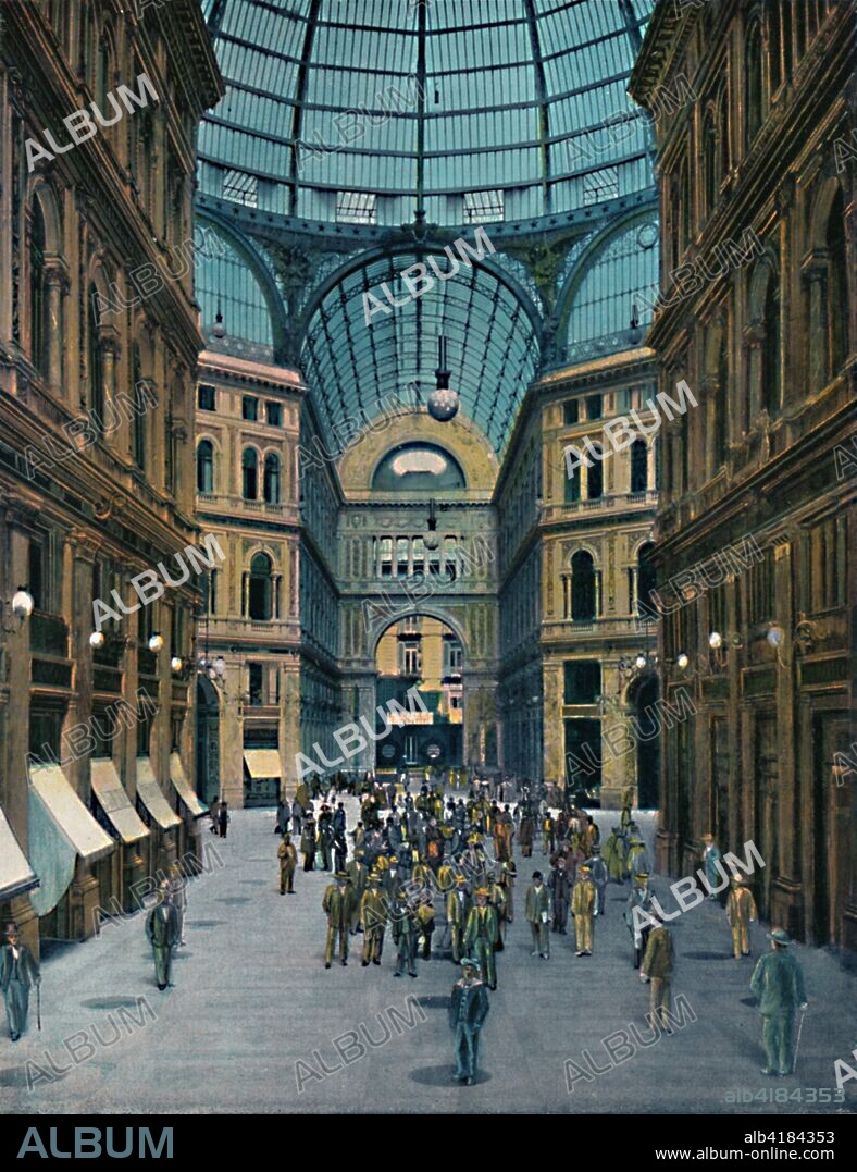 'Napoli - Interno Galleria Umberto I', c1900. Built between 188-1891, designed by Emanuele Rocco during the Risanamento. The building is part of the UNESCO listing of the Historic Centre of Naples as a World Heritage Site. From "Napoli".