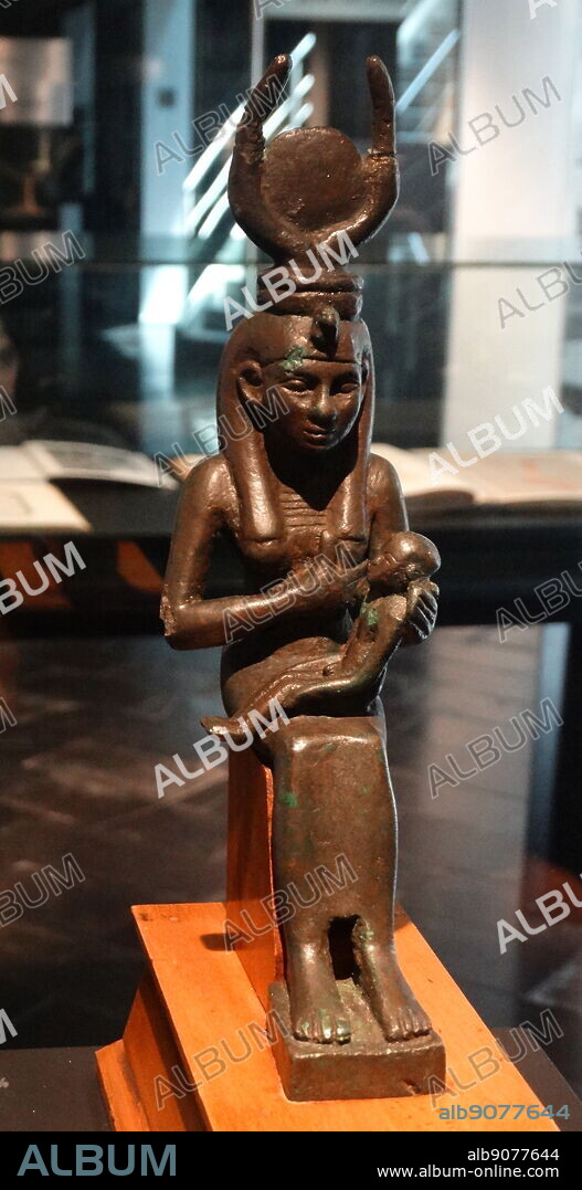 Silver figure of the Egyptian Goddess Isis holding Harpocrates 715-332 BC.