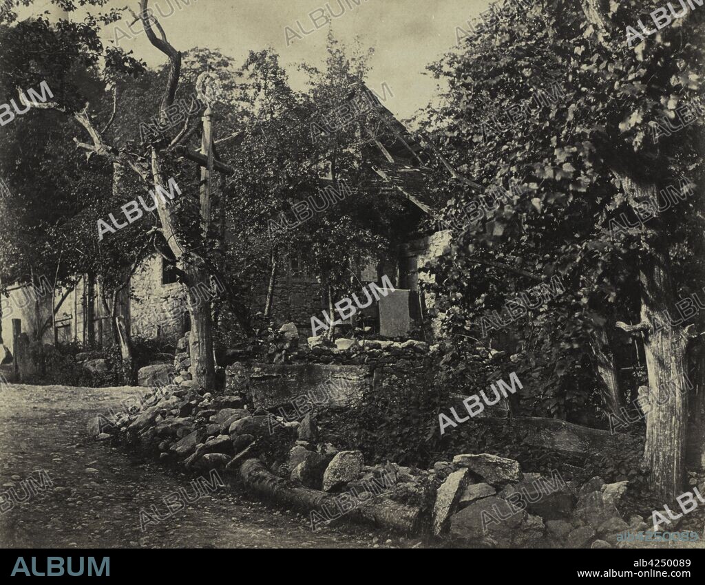 Rural Scene with Stone Building and Cross, c. 1857. Charles-Fortunat-Paul-Casimir Perier (French, 1812-1897). Albumen print from wax paper negative; image: 19.7 x 25.3 cm (7 3/4 x 9 15/16 in.); matted: 40.6 x 50.8 cm (16 x 20 in.).