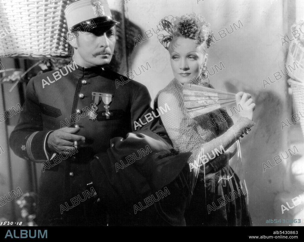 LIONEL ATWILL and MARLENE DIETRICH in THE DEVIL IS A WOMAN, 1935, directed by JOSEF VON STERNBERG. Copyright PARAMOUNT PICTURES.