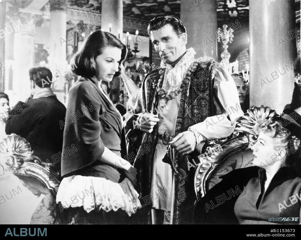 MICHAEL RENNIE, SHELLEY WINTERS und SILVANA MANGANO in MAMBO, 1954, unter der Regie von ROBERT ROSSEN. Copyright PARAMOUNT PICTURES.