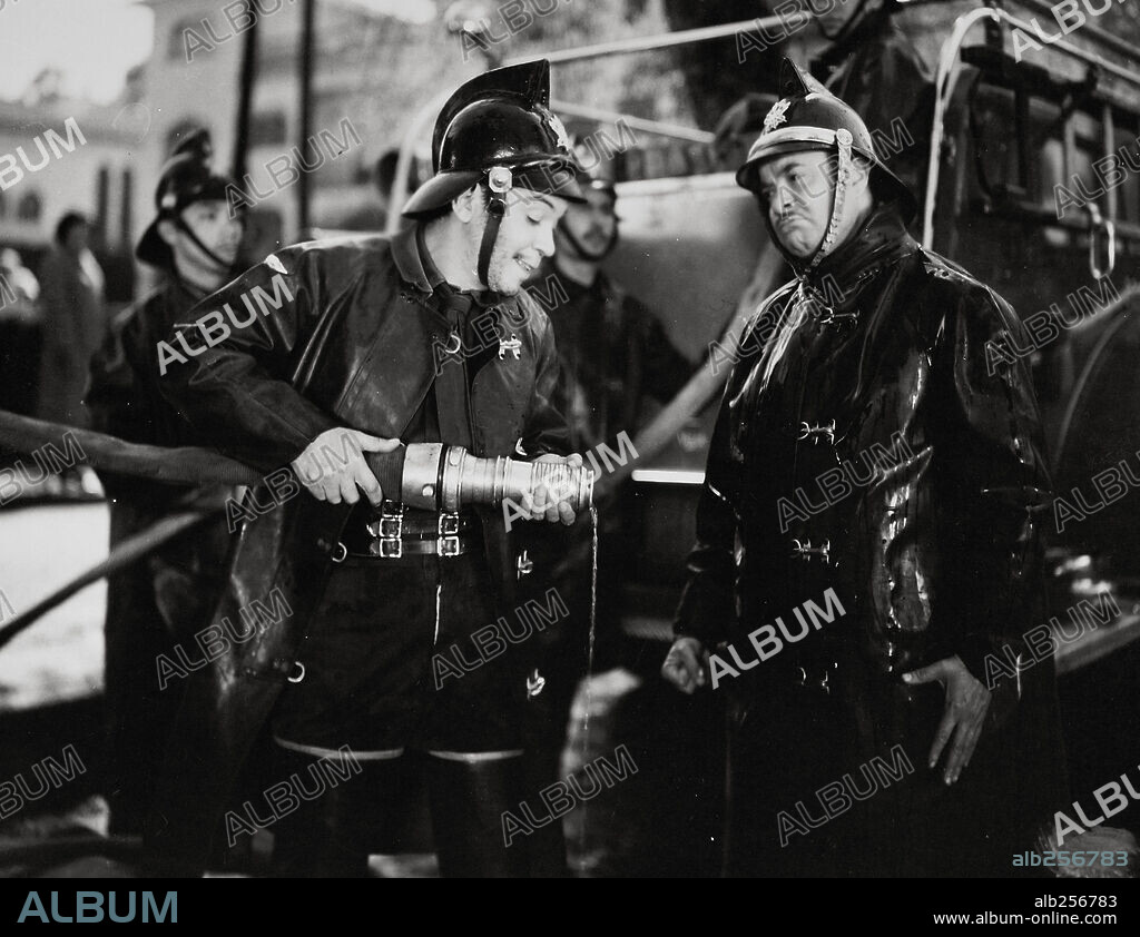 CANTINFLAS in EL BOMBERO ATÓMICO, 1952, directed by MIGUEL M. DELGADO. Copyright POSA FILMS, S.A.
