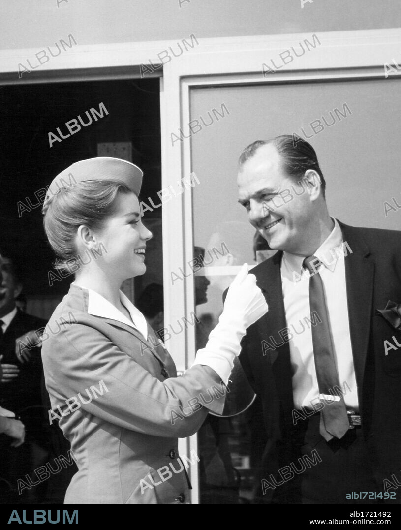DOLORES HART and KARL MALDEN in COME FLY WITH ME, 1963, directed by HENRY LEVIN. Copyright METRO GOLDWYN MAYER.