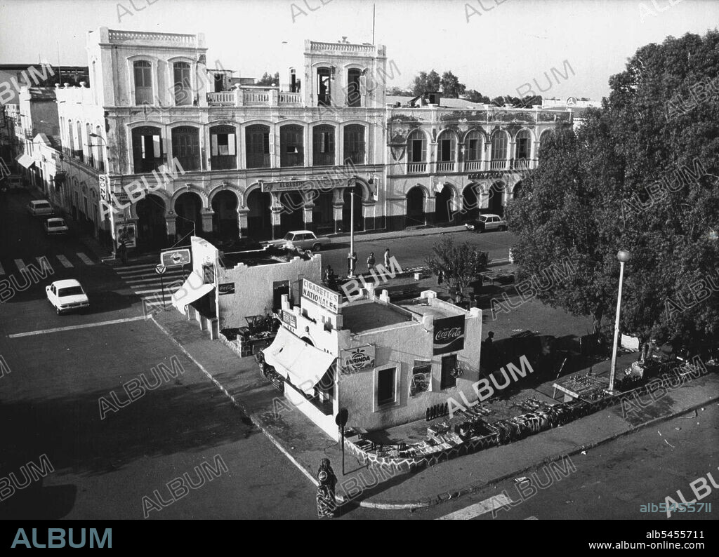 TFAI Views: Djibouti Town Centre -- An overall view of Place Menelik, the principal square in Djibouti, capital of TFAI (French Territory of the Afars and Issas). TFAI, formerly French Somaliland, was renamed in 1967; it is France's last toehold in Africa. December 17, 1975. (Photo by Peter Fraenkel, Camera Press).