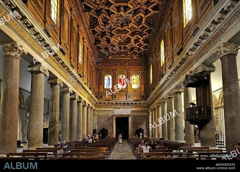 Nave with antique Ionic columns and coffered ceiling by Domenichino, Basilica Santa Maria in Trastevere, Rome, Lazio, Italy, Europe.