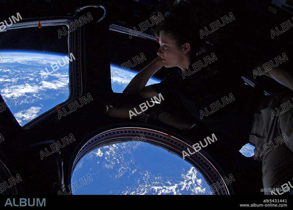 Sep 15, 2010 - There's no place like home. Peering out of the windows of the International Space Station (ISS), astronaut TRACY CALDWELL DYSON takes in the planet on which we were all born, and to which she would soon return. About 350 kilometers up, the ISS is high enough so that the Earth's horizon appears clearly curved. Astronaut Dyson's windows show some of Earth's complex clouds, in white, and life giving atmosphere and oceans, in blue. The space station orbits the Earth about once every 90 minutes. It is not difficult for people living below to look back toward the ISS. The ISS can frequently be seen as a bright point of light drifting overhead just after sunset. Telescopes can even resolve the overall structure of the space station. The above image was taken in late September from the ISS's Cupola window bay. Dr. Dyson is a lead vocalist in the band Max Q..(Credit Image: © NASA/ZUMAPRESS.com).