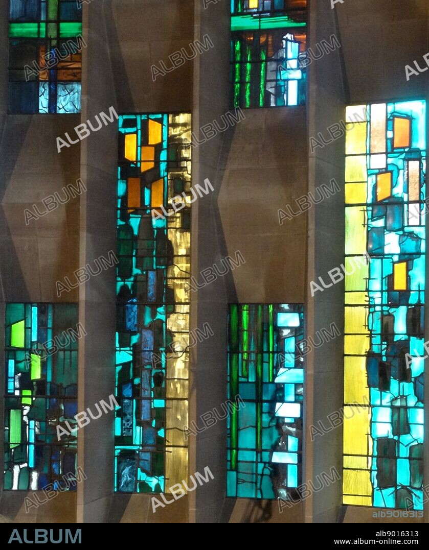 stained glass windows designed by john Piper depict the light of god, at the New St Michael's Cathedral, Coventry.