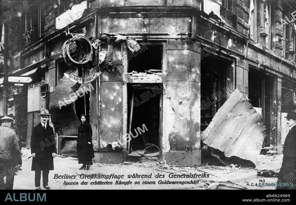 German Revolution 1918/1919: Traces of the street fights can be seen on the facade of a gold shop in Berlin, Germany, during the street fights in early January 1919. Photo: Fotoarchiv für Zeitgeschichte/Archiv. 1919