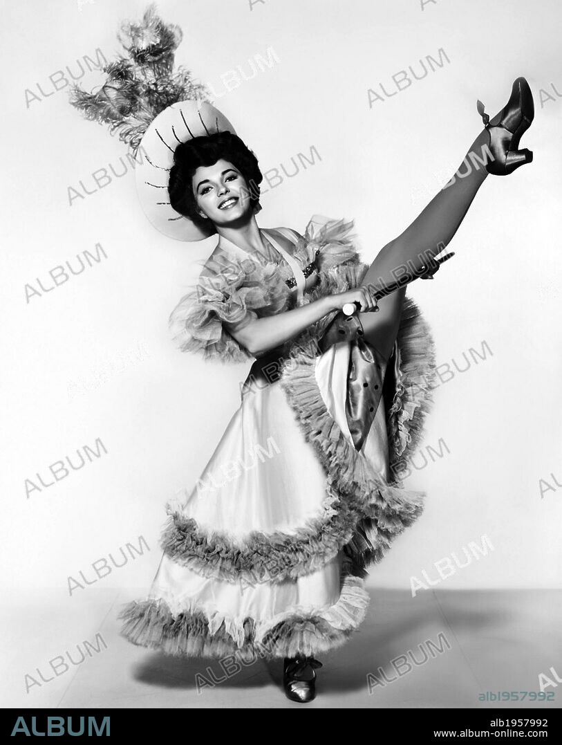 JOAN COLLINS en LA MUCHACHA DEL TRAPECIO ROJO, 1955 (THE GIRL IN THE RED VELVET SWING), dirigida por RICHARD FLEISCHER. Copyright 20TH CENTURY FOX.