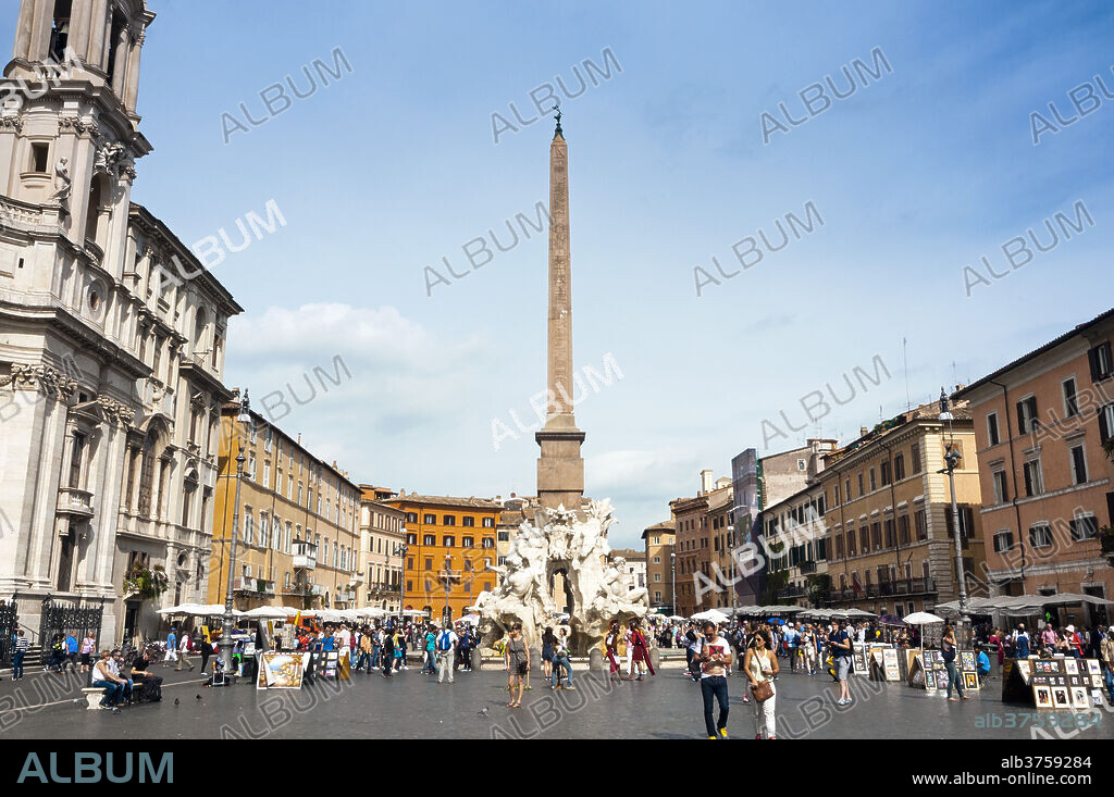 Fontana dei Quattro Fiumi, topped by the Obelisk of Domitian, Piazza Navona, Rome, Lazio, Italy, Europe.