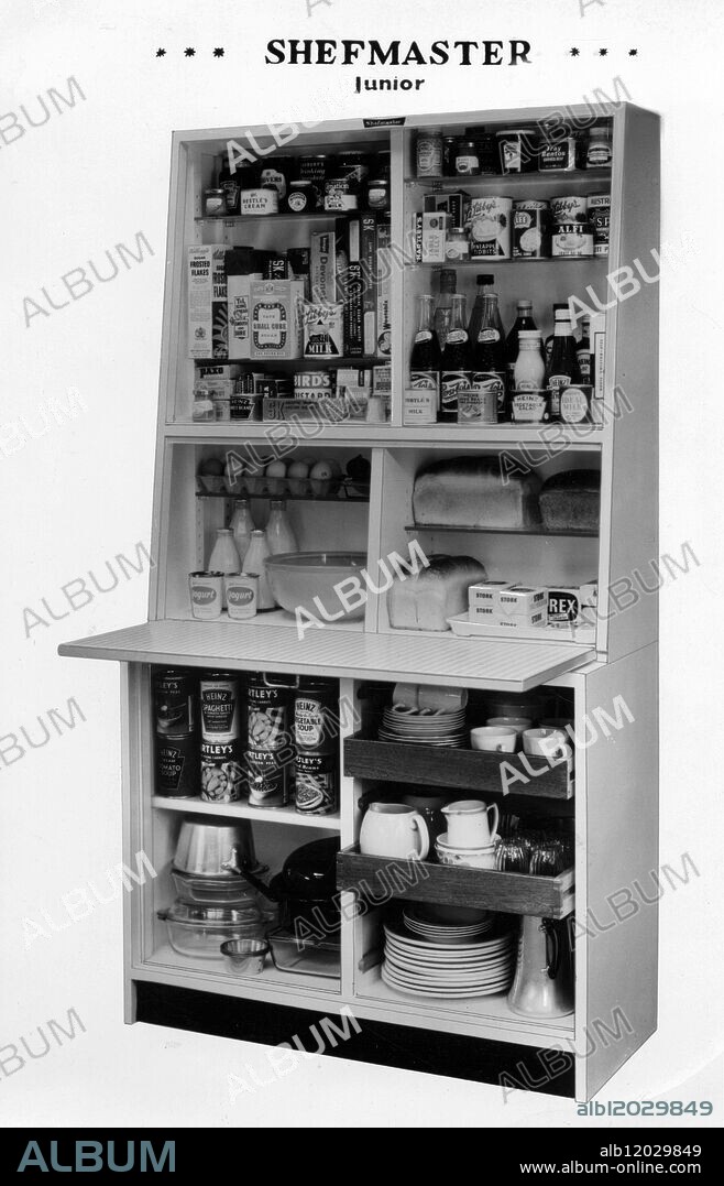 Kitchen cabinet with fold down work surface and pull out china containers. Junior Shefmaster.