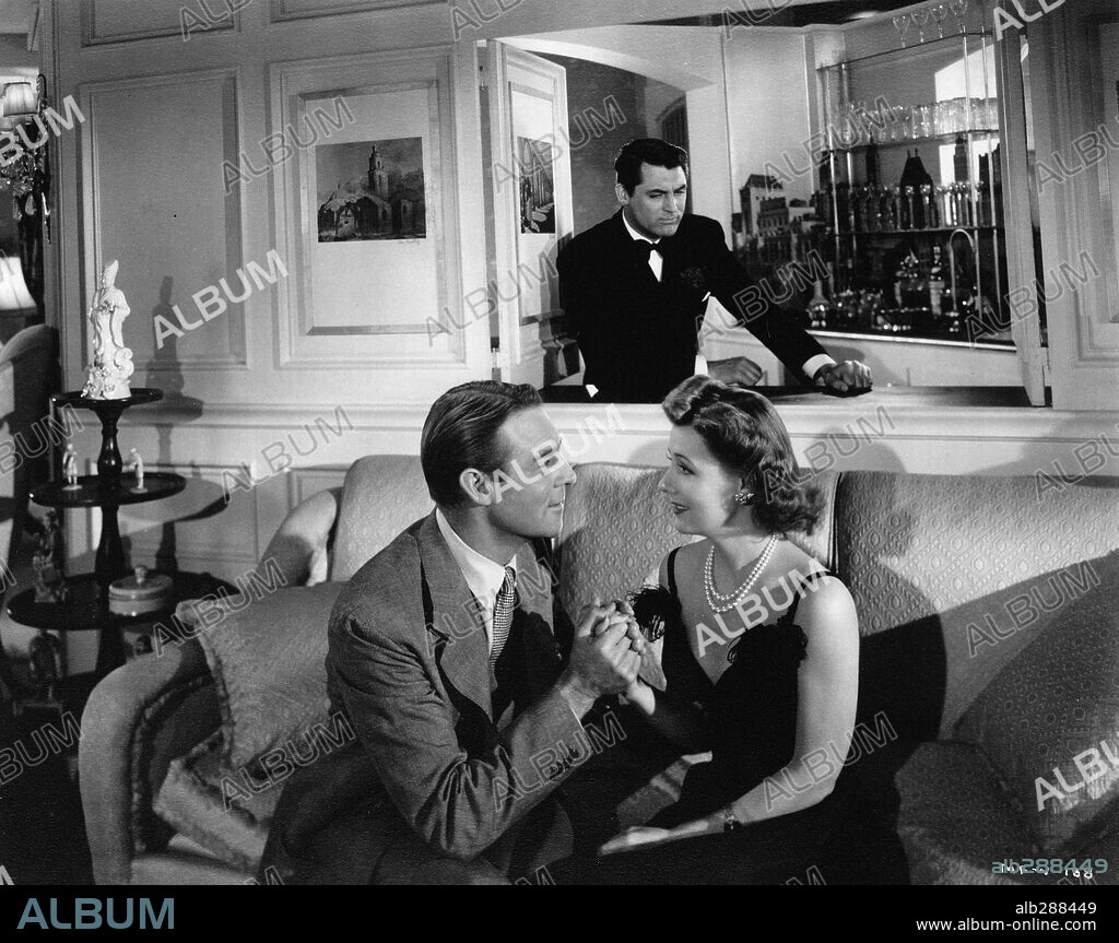 CARY GRANT, IRENE DUNNE and RANDOLPH SCOTT in MY FAVORITE WIFE, 1940, directed by GARSON KANIN. Copyright RKO.