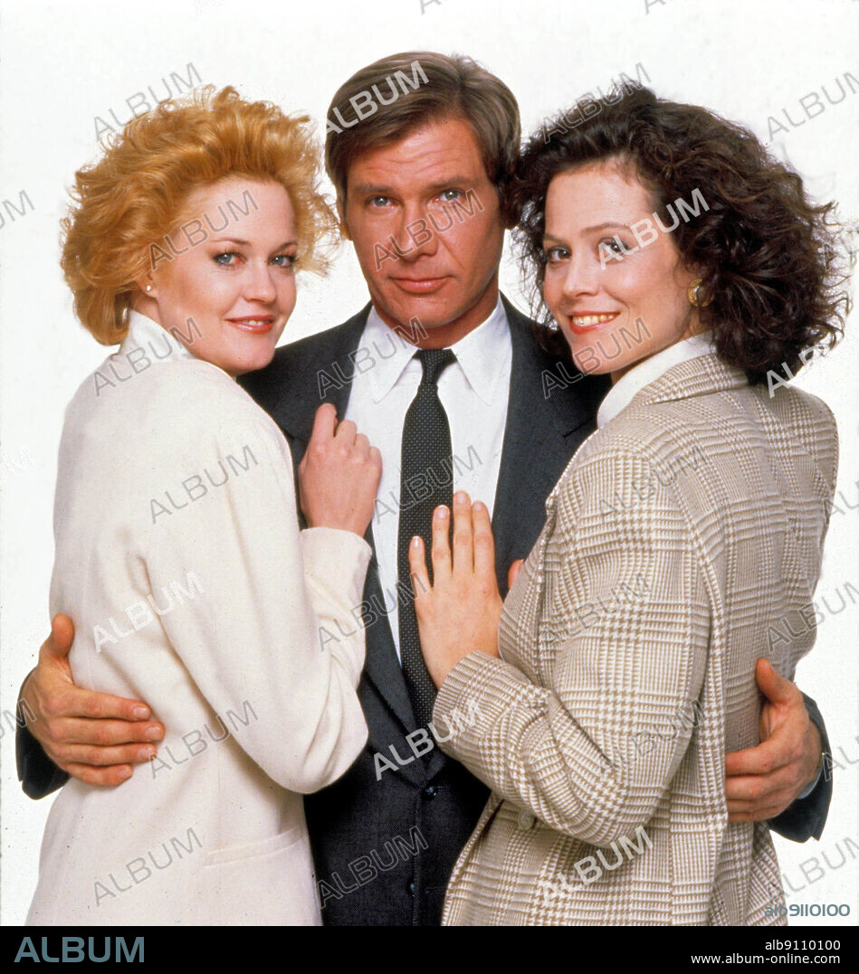 HARRISON FORD, MELANIE GRIFFITH and SIGOURNEY WEAVER in WORKING GIRL, 1988, directed by MIKE NICHOLS. Copyright 20TH CENTURY FOX.