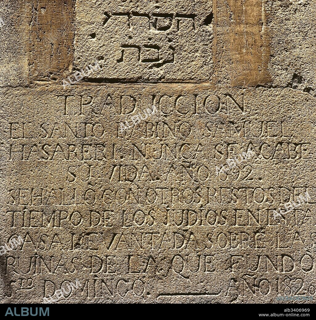 Hebrew gravestone with reference to the foundation of a hospital by Rabbi Samuel Hassardi. In the lower part, the Spanish translation. Marlet Street, no. 1. Gothic Quarter. Copy of the original, whis is in the Museum of History of the City. Barcelona, Catalonia, Spain.