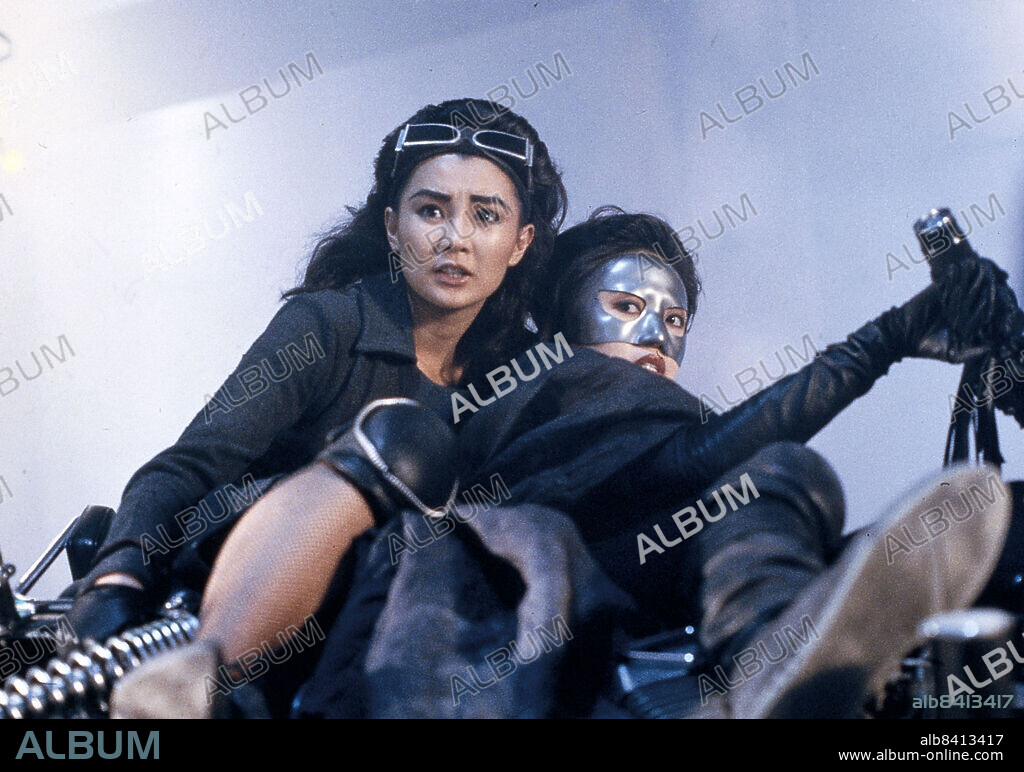 ANITA MUI and MAGGIE CHEUNG in THE HEROIC TRIO, 1993 (DUNG FONG SAM HAP), directed by JOHNNIE TO. Copyright China Entertainment Films Production.