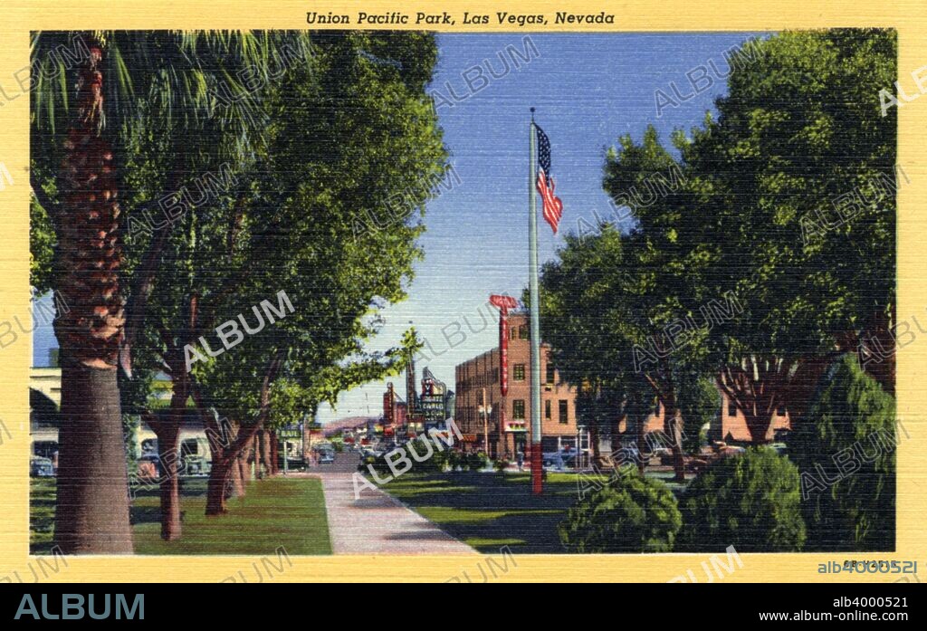 'Union Pacific Park, Las Vegas, Nevada', postcard, 1946. Vintage linen postcard showing a view of downtown Las Vegas from Union Pacific Park. Large trees line the walkway and the Sal Sagev hotel is seen in the distance.