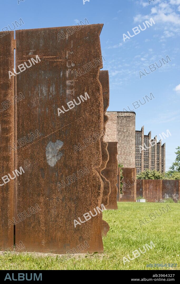 Sculpture, Herbert Art Gallery and Museum, Jordan Well, Coventry, West Midlands, 2014. Vew from the south of the corten steel panels marking the boundaries of buildings that existed in Bayley Lane from the 1300s up to their destruction in 1940 during WW2. Cut into each panel are the names of inhabitants from periods in each building's history.