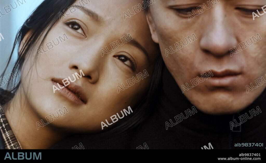 HONGSHENG JIA and XUN ZHOU in SUZHOU RIVER, 2000 (SUZHOU HE), directed by LOU YE. Copyright ESSENTIAL FILMPRODUKTION GMBH.