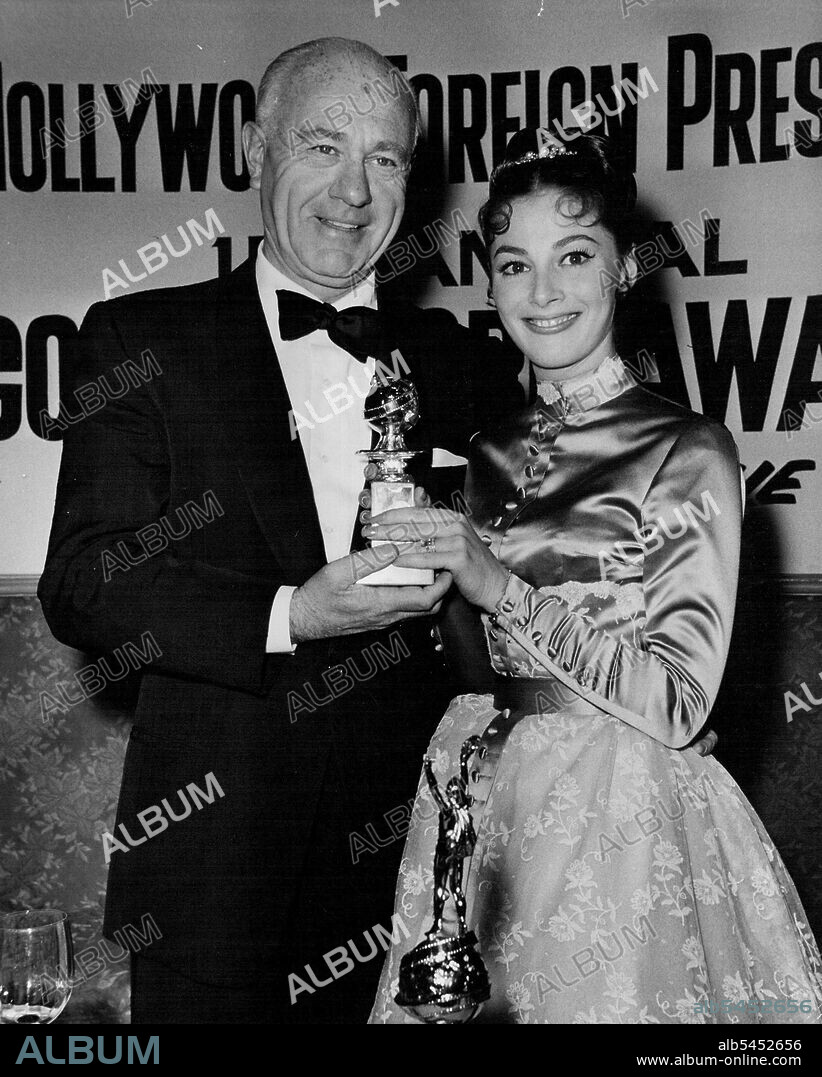 Pier Angeli presents Globe to Sol Seigel for Best Film of Year (comedy) Les Girls. April 11, 1948. (Photo by Jay Scott).