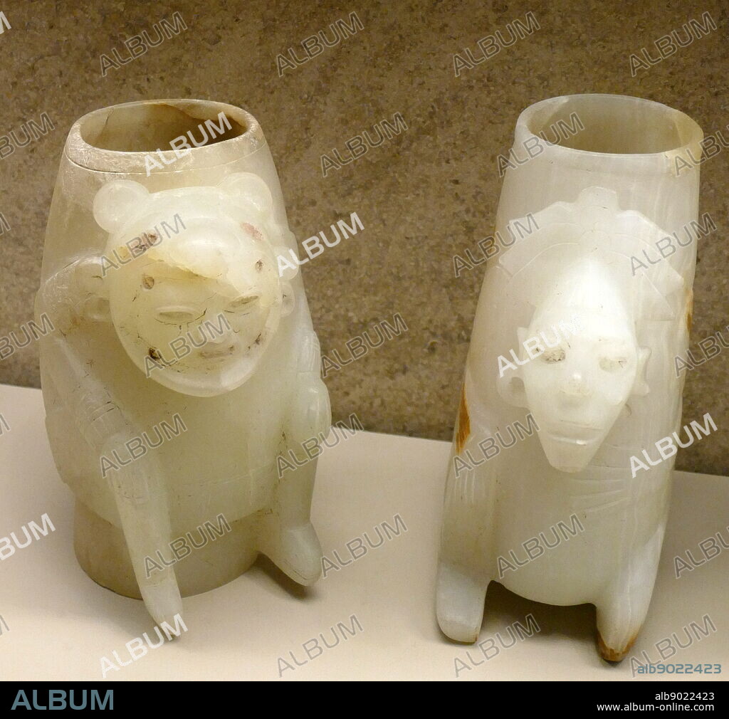 Carved and polished Onyx (tecali) vessels with a seated figures. Post-Classic Date900-1521. Found at Isla de Sacrificios, tomb, Veracruz, Mexico.
