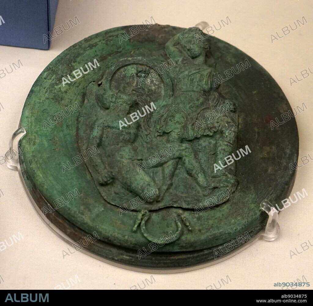 Bronze repousse relief depicting a Nike sacrificing a bull. Dated 350 BC.